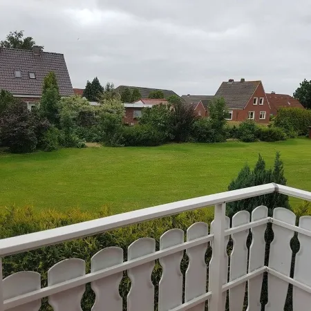 Upper apartment in Westeraccum with balcony