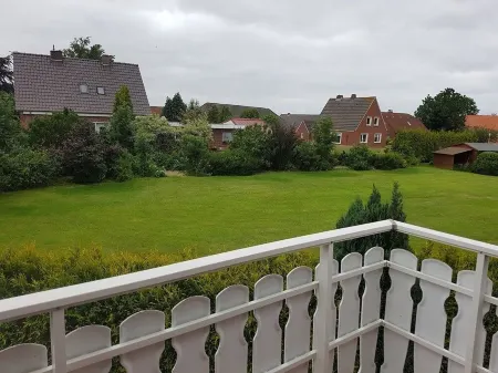 Upper apartment in Westeraccum with balcony