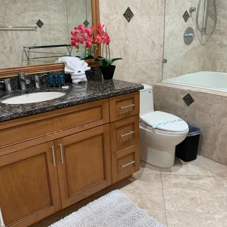 Entire condominium with a pool view, steps from the beach