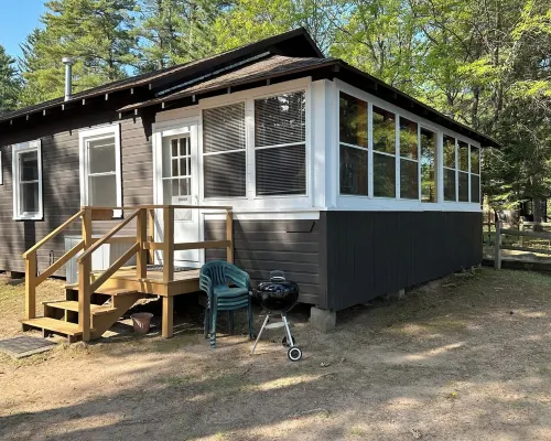 Charming Cedar Lakeside Cottage at Elbert's Resort Hotels in St. Germain