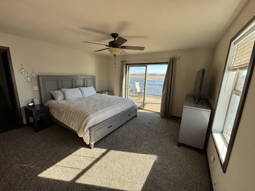 Secluded Elkhorn River Retreat.  Full sized home overlooking 250+ acre lake.