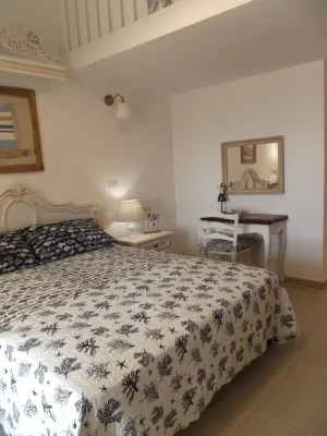 LA VELA suite Hotels near Spiaggia 1 - Oasi Biderosa