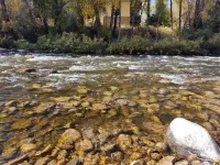 Modern Ground Level Riverfront Condo -  World Class Skiing - Private Fly Fishing