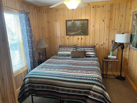 Ben Ranch Cabin # 2 located in a century old Pecan Orchard. 2 Bedroom plus couch