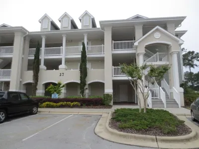On The Golf Course! Steps From The Pool!  10 Minutes From Sunset Beach!