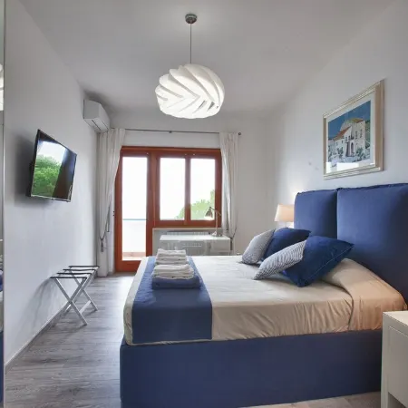A terrace overlooking the gulf. Stylishly furnished apartment for relaxing days.