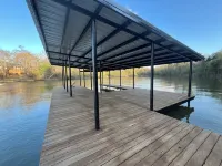 Modern lakefront cabin nestled in the piney woods of East Texas. Pet Friendly!