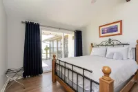 Quaint waterfront home with private beach