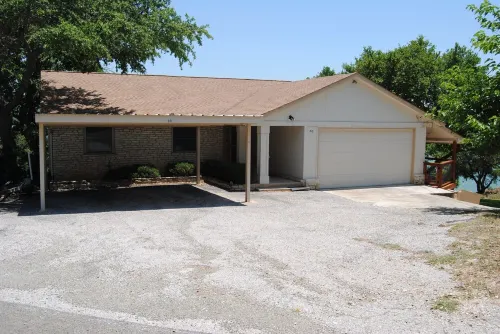 Lake Front property on Inks Lake with beautiful lake views /dock/swimming area.