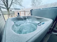 Luxury Suite • Private Yard • Hot Tub • King Bed