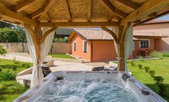 Attractive Holiday Home with Pool, Hot Tub, Patio, Courtyard