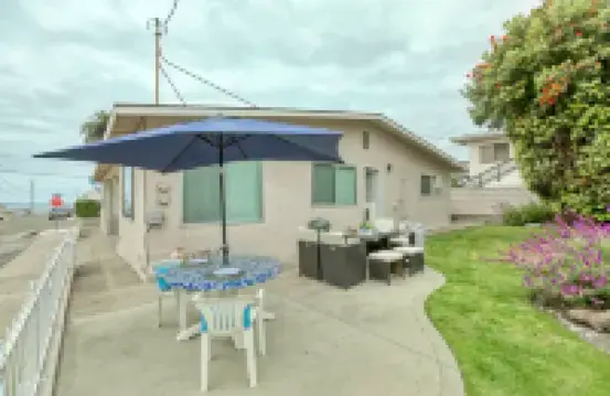 Charming Duplex with Enclosed Yard and Smart TV - Inviting Coastal Retreat