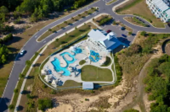 Community Pool and Covered Deck - Charming Coastal Haven