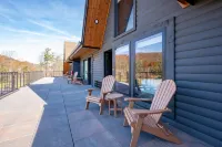 Electric Fireplace and Outdoor Pool Views - Spacious Inviting Hotels in Terra Alta