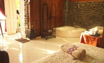 The Riverside Javanese Cottages