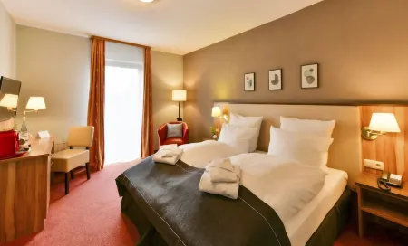 City Hotel Meckenheim Отели в г. Райнбах