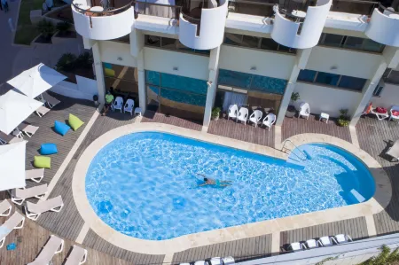 Marine Heights Suites Отели в г. Герцлия