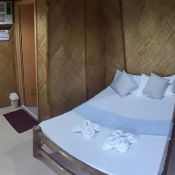 กวนหนานส์ เพลซ รูม แอนด์ เรสโต บาร์ โรงแรมใกล้Dive Society Malapascua