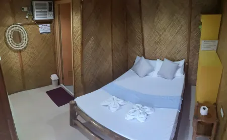 Guanna's Place Room and Resto Bar Отели рядом с достопримечательностью «Логон Бич»