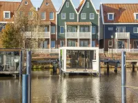 Houseboat in Volendam by Ijsselmeer
