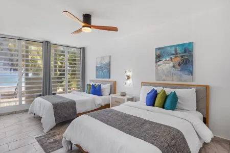 PLAYA AZUL1 2ND FLOOR BEACHFRONT LUX  DESIGNER CONDO.