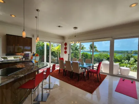 "Gorgeous, 4-bedroom, 4.5-bathroom home with Beautiful Water and Sunset Views