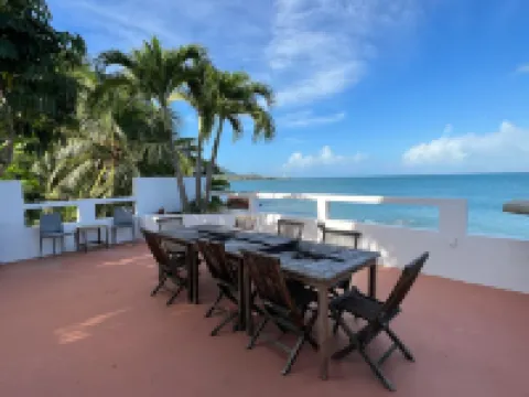 Stunning waterfront, art deco family compound cascading to the water’s edge