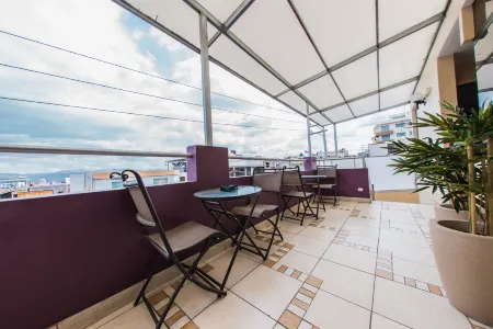 Los Leones Hotel Boutique Отели в г. Кайма