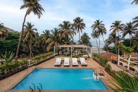 Stone Wood Beach Resort, Vagator Отели в г. Вагатор