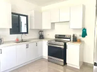 Charming 2-bedroom townhome with WiFi, fitness room in Runaway Bay