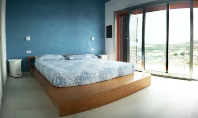 descrizione Spiaggia di Punta Molentis附近的飯店