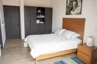 Quick walk to Cerritos Beach, private Hot tub, pool, gym, ocean & mountain VIEWS