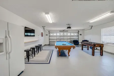 Spacious 4-bedroom house in sunny Panama City Beach with AC, WiFi, & Game Room!