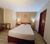 Hotel Asturias Inn - Losmen