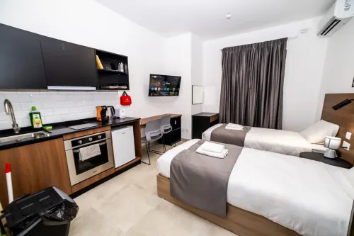 New Studio Apartment with Kitchen – 2 Single Beds by HostMT - 2-Star