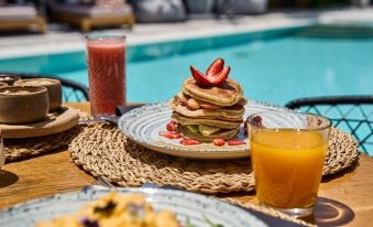 Adorno Beach Hotel and Suites