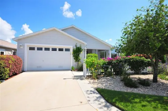 Experience the fun and excitement of The Villages in this beautiful Patio Villa.