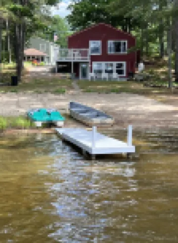 Maine Lakefront Cottage Rental with Sandy Beach