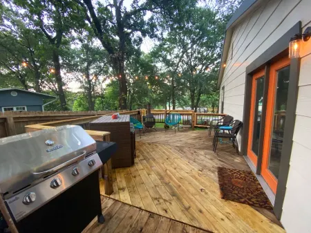 Spacious Modern Lake Retreat w/ Deck! Only a short Walk to Swimming and Fishing!