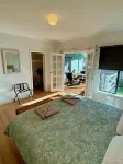 Town Hideaway- Spacious house by the river and town centre. Couples and groups.
