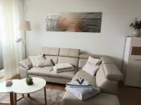 Modern top floor apartment with a view of the sea and Stralsund