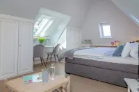 Cozy 1-room apartment with box-spring bed Hotels in Tinnum