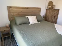 BOHO CONDO w/Rooftop Hot Tubs! 2 minutes to downtown TC & Beaches. Dog Friendly!