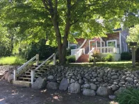 The Boathouse on Waukazoo!  Beach, Bars, Brewery all within a block!