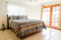 The house is in the middle of town, next to HEB with an amazing backyard.