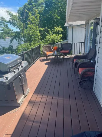 Lake house with three decks private dock and swim platform.
