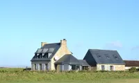 Fishing house in front of the sea.