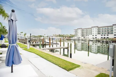 Enjoy sunny water views from your private lanai.  Steps to Madeira Beach.