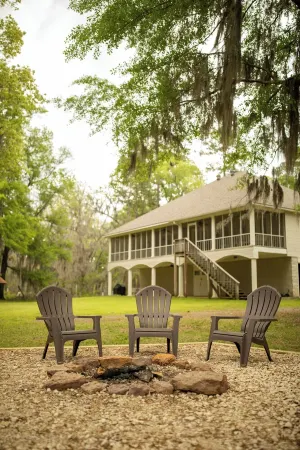 Elegant WATERFRONT home with private boat ramp/dock, elevator, & unmatched view!