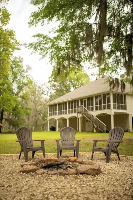 Elegant WATERFRONT home with private boat ramp/dock, elevator, & unmatched view!